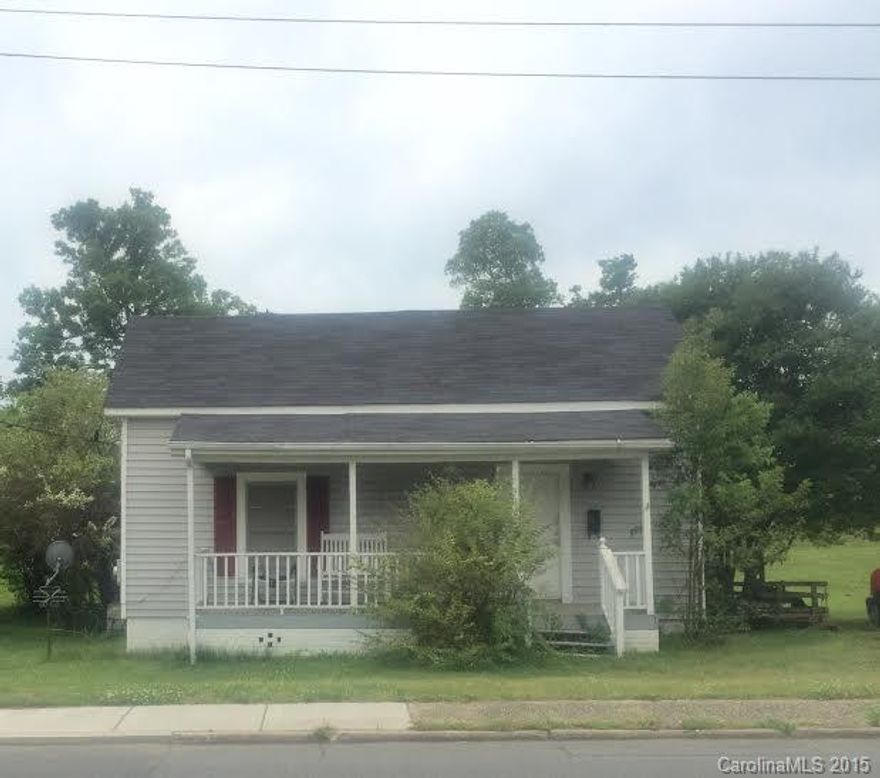 Check out this cute home in Downtown Fort Mill area.  This home is zoned commercial/residential.  Age of home is estimated, there is no record.
