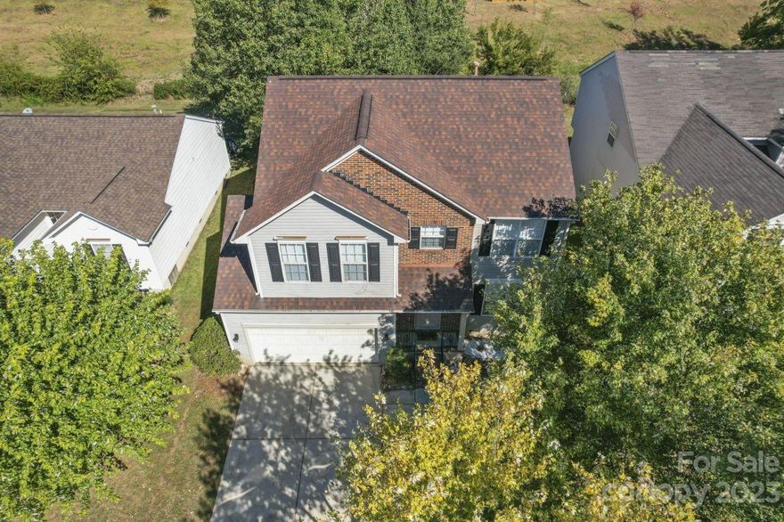 Great starter home once used as a rental property in Concord. 4 bedrooms, 2.5 baths, walk in closets, lots of storage. Well crafted hardwood flooring follows you through the front room, living room, upstairs loft + bedrooms. Primary bathroom has extra door access to secondary bedroom, jack and jill style. One of the larger homes built in Meadowbrook, a cozy little neighborhood just minutes from Afton Ridge, Concord Mills, Harrisburg and University. Refrigerator and Washer/Dryer will convey. New interior paint, exterior shutter paint, lighting and Hunter fans in all rooms, just pressurewashed all concrete, painted back steps.