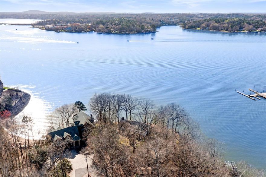 This property is perfectly placed upon a beautiful lot with 180 degree view of Lake Wylie.
