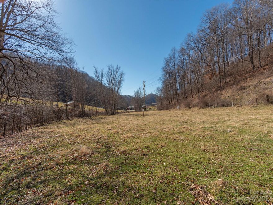 SURVEY COMPLETED! 3.28 Acres with about 1.40 Acres flat and cleared for a great potential build site.
Multiple uses include cattle/horses, residential, small development, etc. Seller has a quote to install a culvert over the creek needed to access the property from Ponder Creek Rd. Call listing agent for details.