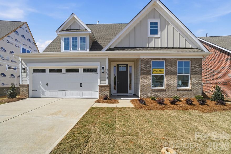 Welcome to a new age-restricted community in Gastonia close to shopping, dining and other conveniences! This 1.5-story Amelia floorplan has 3 bedrooms, 3 full baths and 1,975 square feet of living space. The main living area includes the kitchen, breakfast area and family room with a Cosmo, direct-vent gas fireplace with shiplap surround and wood mantel. The kitchen has white cabinets, white quartz counters, a tile backsplash, and stainless appliances. The main floor also includes the primary suite with a tray ceiling and tiled, walk-in shower and a secondary bedroom along with a hall bath that has a tiled, 4-foot shower with seat. The upper floor has a large loft, spacious bedroom, and full bath with a tub/shower combo. The rear of the home features a screened porch and a patio. Other extras include a tray ceiling in the foyer, white cabinets & quartz counters in all baths, upgraded trim package, and metal stair balusters. Visit today!