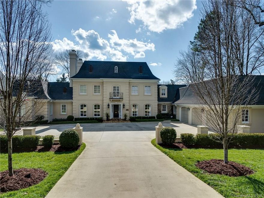 Fabulous home suited for the most discriminating Owner.  Spectacular setting with a tree-lined driveway, and motorcourt leading to the Hard-Coat Stucco home.  Front Entry provides a preview to the extensive moldings throughout.  Dining Room leads to large Kitchen/Entertainment Area.  Ki. Island has room to eat, as well as prepare food. Office in Ki.  High-End Appliances.  Fabulous 1st Fl. Owners' Retreat, w/2nd Off., 4 BRs upstairs.  Wonderful Covered and Uncovered Porches.  Att.3-car Gar.