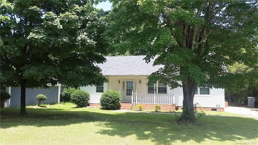 Cute little starter home on a cul-de-sac. Front porch for hanging ferns, big flat yard & super friendly neighborhood w/ holiday parades & neighborly cookouts.  Open floor plan, gas logs in the frpl, whole house water filter, neutral decor, real hardwood floors in the dining area. All appliances remain, replacement windows in 2006, water heater new in 2015, security system. The Waters of Steele Creek is a lovely, well kept neighborhood  w/tree lined streets and easy access to schools & shopping.