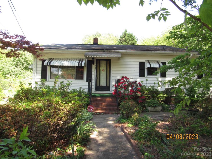 Vinyl exterior home, with extra storage buildings, carport and fenced backyard. Level yard with some mature shade trees. Home needs some maintenance. Cash buyers only.