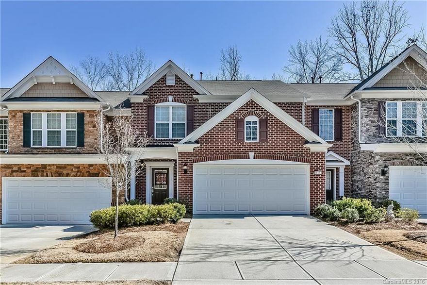 Stunning Full-Brick Townhome in Ardrey Kell Villages!!!  This one has it all---Fantastic Ballantyne Location, Top-Rated Schools, & a Private Lot with Trees-Galore in Front & Back---This Unit is a MUST-SEE! Walk to Shopping & Dining! This 3 BR, 2.5 BA Home features Gleaming Hardwoods throughout Main Level, Granite, Tile in all Baths/Laundry/Kitchen & Neutral Paint Throughout.  The Dramatic Hardwood Staircase is Breathtaking! This home is Perfect for Entertaining Family & Friends. Welcome Home!