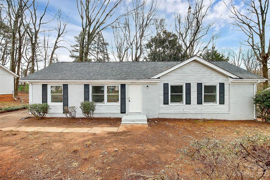 Welcome to this charming, renovated ranch-style home located 15 mins from Uptown, 8 minutes from White Water Center and 10 mins from CLT airport. Enjoy single story living with a spacious 1268 sqft of living space, where the open layout seamlessly connects the living areas. With 3 bedrooms & 2 renovated bathrooms, this home has the ideal layout. As you explore, you'll find brand new flooring, new lights, and fresh paint throughout. The furnace was replaced in January 2024. The kitchen has brand new appliances - oven, dishwasher, microwave & refrigerator. Outside, the large lot provides ample space for outdoor activities and entertaining. You'll love the private outdoor deck, perfect for enjoying your morning coffee or hosting gatherings with friends and family. The roof was replaced in 2022, the windows are newer, and the exterior just received a fresh coat of paint. Don't miss the opportunity to make this delightful, move-in-ready home your own!