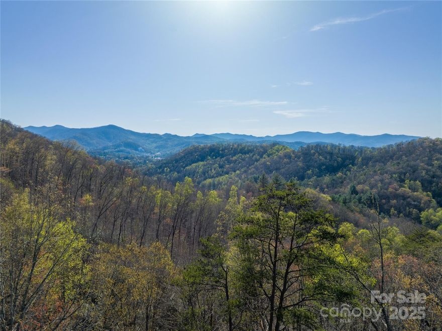 38+/- Acres of Unrestricted Mountain Land – Natural Spring, Views & Great Location! Discover your private mountain retreat nestled just minutes from Western Carolina University, the quaint towns of Cullowhee and Sylva, and a nearby ATV park with miles of trails winding through the National Forest. This unique property features a pristine natural spring, mountain views, and a diverse elevation ranging from 2,400’ to 2,900’, offering multiple ideal homesites. Whether you're looking to build a secluded getaway or a family compound, this tract provides the space, freedom, and natural beauty to bring your vision to life. Enjoy year-round outdoor recreation with easy access to hiking, riding, fishing, and more — all while being conveniently close to local amenities, restaurants, and university activities. With no restrictions, the possibilities are as wide as the views.