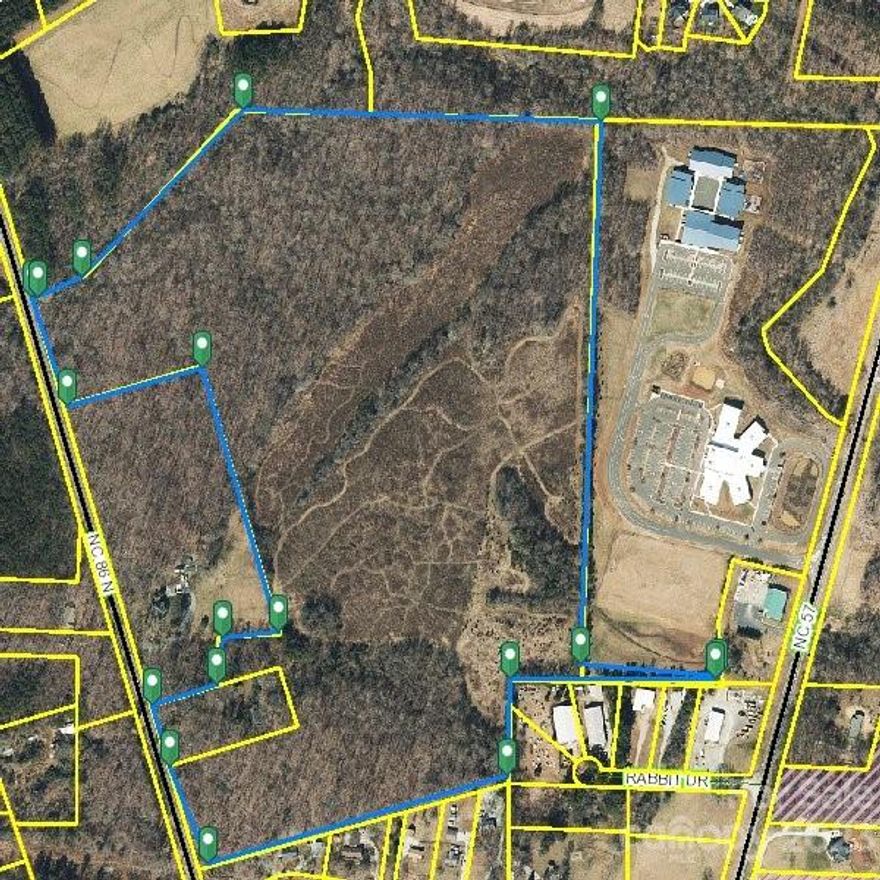 Rare opportunity to acquire 80 acres in Orange County North Carolina and Triangle area. One of the Southeast fastest growth areas. Located just north on Hillsborough NC but not in city limits, so not city taxes. Easy access to Chapel Hill, Durham, & Raleigh. Property has been farmed in the past, so about half is cleared with the remaining covered in Hardwoods, so ideal spot to build your family estate, equestrian farm, or development opportunity now or in the future. Located on Hwy 86 with multiple entry points. Site backs up to new highly successful Eno River Academy Charter School. Property does have county water & city sewer at the property. Town of Hillsborough owns & controls the waste water and sewer lines located at the property. Any access to water and sewer would have to be approved by the town. Town has not been agreeable to supply water and sewer for residential mixed use at this time but has stated they would be interested in a Jobs producing commercial use.