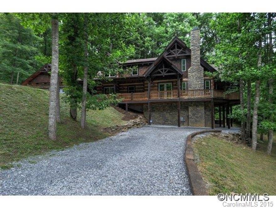 No expense was spared when building this hand hewn masterpiece. Start with the extensive rockwork and outdoor living space sitting amidst the mountain view and creek.  Savor the inside with solid wood floor, laurel handcraft stair rail, the beautiful timber framework exposed to the interior of the home - all creating a breathtaking effects of open spaces, craftsmanship and extraordinary living environment.  Why build when you can buy this beauty.