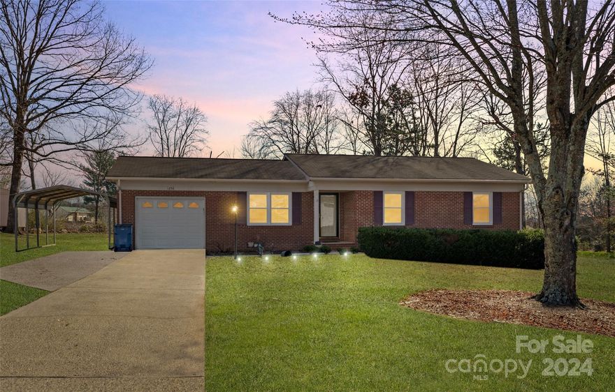 Located in the desirable Mountain View area, this beautiful one level living home features three bedrooms, two bathrooms, one car garage with additional parking, and a fully fenced backyard! This stunning home offers an inviting living and dining area, newly renovated kitchen with granite countertops, two spacious linen closets, and laundry area. Primary bedroom with large closet and bathroom with walk in shower. The third bedroom is perfect for an office space or playroom. Perfect location close to Hickory, Newton, and HWY 321. Call us to schedule your private tour. You don't want to miss this one!