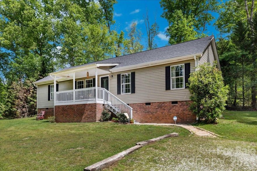 Nature Lover’s Dream! Spread out on this beautiful 3-acre wooded lot featuring a spacious, updated 4-bedroom ranch home. Whether you're harvesting fruit from the blackberry bushes, enjoying the abundant yard space, or relaxing in the quiet, wooded surroundings, this property is a true escape. This "as-is" gem offers the privacy of the country with the perks of shopping, groceries, and dining, all just 15 minutes away. This home is perfectly situated just minutes from Historic Downtown York, where you can enjoy local dining and boutiques. For your daily needs, Walmart, Lowe's, major grocery stores, scenic farms, and fresh produce are also just minutes away.

This single-level, move-in-ready home features no HOA and no city taxes. The spacious primary suite and bath are located on the opposite side of the home from the additional three bedrooms, offering enhanced privacy. Enjoy a beautifully appointed kitchen with informal dining, plus front and back porches—perfect for relaxing or entertaining.