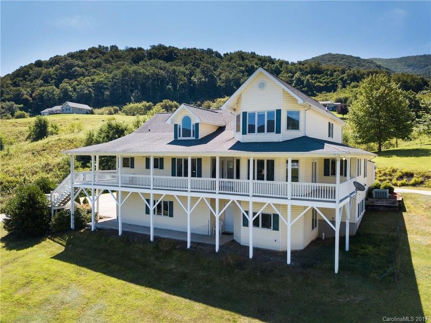 Gentleman's/Hobby Farm with incredible upscale home, modern barn, fenced pasture, full apartment, and amazing Mtn. Views. 3BR/4BA home features open and spacious floor plan with soaring ceilings, high end features, two fireplaces, hardwood floors, spacious rooms, & huge covered porches. Lower level boasts full apartment w/bonus room as BD. Heated and plumbed Barn features 2 stalls with tack room and wash bay.  Beautiful setting and Convenient year round location complete this incredible find.