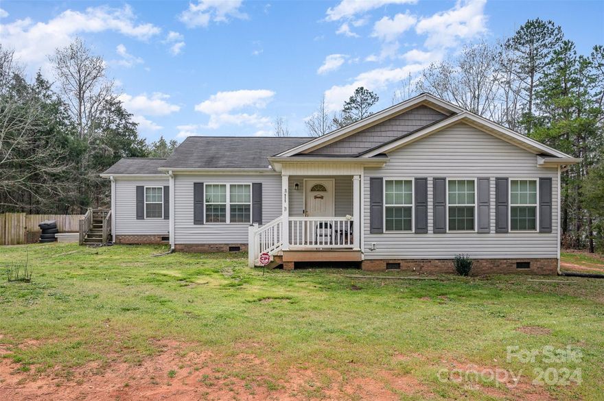3 bedroom home that sits on almost 3 acres! LVP floors installed in 2022. Also added a back door and deck in 2022. Shelters will convey, but kennels on left and back of property will be removed. Fenced in back yard. Creek along back of property. Motivated sellers, please submit all offers! Just appraised at 325k!