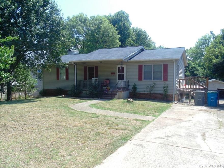 Belmont 5BR Ranch w/finished basement over 2600 sqft!! Detached 24x25 garage workshop on nearly 1/2 acre. This Belmont jewel in the rough holds very nice value for anyone needing lots of living space and a large fenced in back yard. Attached overszd 2 car carport. Several finished large rooms in basement. Gas Log FP in basement living rm. The home has practically 2 living qtrs for a large family. Hundreds of sqft of driveway. Ample sized bedrooms. Mins from schools, entertainment, & shopping.