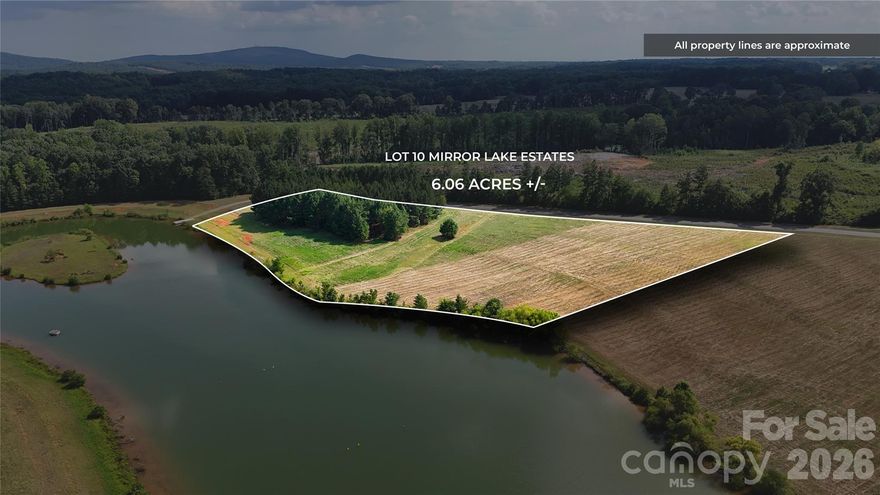 Lot 10 in the gated Mirror Lake Estates features 6.06 acres of breathtaking waterfront property, offering an ideal blank canvas for your dream home. Enjoy expansive lake views and direct access to a host of activities, including powerboating, water skiing, swimming, and fishing—combining luxury living with endless recreation right at your doorstep.