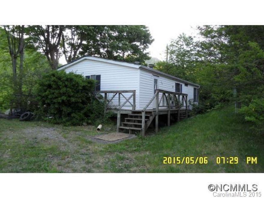 MULTIPLE OFFERS: HIGHEST & BEST BY 12:00 8/7/15. Has double-wide MH in need of repairs; well water mechanics and furnace have been removed. SOLD AS-IS; SEE ALL PICTURES & MLS ATTACHMENTS. Sellers/Agents make no representations. BUYERS/AGENTS advised to verify all info & perform all inspections. UTILITIES CAN NOT BE TURNED ON FOR D.D. See your agent for viewing, for additional information, for submitting offer. NEED INVESTOR/CASH BUYER