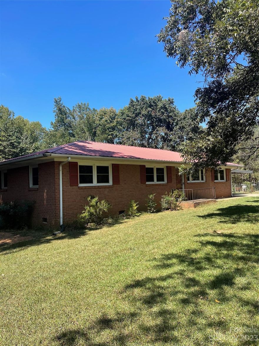 Pigs, goats, chickens on 7.56 acres. Remodeled brick ranch with 3bd/1.5ba, fireplace, granite in kitchen, large master bath, large workshop.  If you want country living, this one is for you.