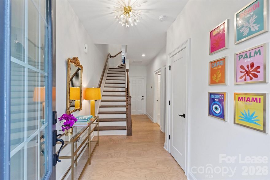 Welcome to this updated stylish townhome in highly sought-after Elizabeth Glen neighborhood! Step inside to discover a true chef's kitchen featuring to-the-ceiling white cabinets with glass inset accents, a gas cooktop, stainless steel range hood, herringbone tile backsplash, & elegant brass pendant lights & cabinet hardware. The spacious primary suite boasts a tray ceiling and walk-in closet with custom built-ins. The primary bathroom is an oasis, complete with upgraded back-lit mirror & designer light fixtures. Ascend to the bright and inviting 4th floor, currently serving as a home office with custom arched built-ins & private half bath, all connecting to a delightful rooftop terrace—perfect for relaxing after a long day. This meticulously maintained home features hardwood floors & updated lighting throughout. The 2-car garage provides side-by-side parking & generous storage room. Ideally located just blocks from popular spots like the Crunkleton, Rosemont, and Puerta!