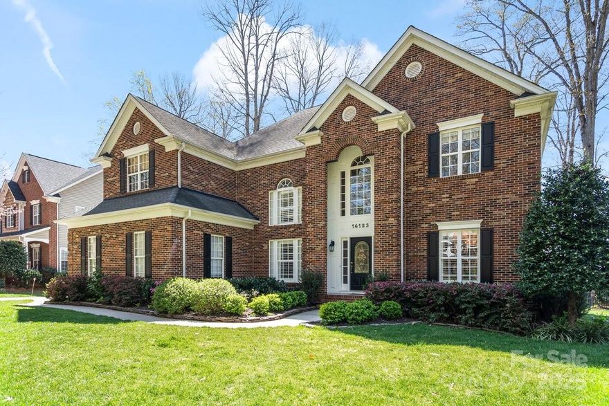 Desirable Macaulay home w/5 bedrms, 3 full bathrms plus bonus room! Step into this meticulously maintained home & feel all the open space & natural light this home offers! Main level features: 2-story great room, formal dining room, cozy living room w/coffered ceilings & gas fireplace, bedroom & full bathroom, large kitchen w/island & an abundance of cabinet space perfect for gatherings. Interior was just painted a fresh neutral tone! Upstairs you will find the bright primary suite along w/3 additional spacious bedrooms & HUGE bonus room. The best part about this home is the inviting screened-in back porch w/ bead board ceiling & wood burning fireplace overlooking an immaculately kept yard w/blooms year-round. The fully fenced yard is extra wide & flat! 3-car garage offers an EV car charger. New high quality vapor barrier added to crawl space 2021. Macaulay is known for its super friendly community & close proximity to Birkdale Village and I-77. Quiet street w/short walk to Grand Oak!