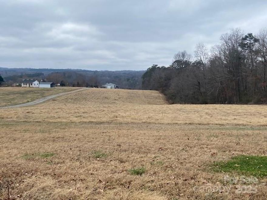 Looking for a view, take a look at this country land w/long range views on paved road and only minutes to Morganton, Marion and beautiful Lake James. Approx 3.36 acres nearly level ready to start your build today.  Modular of Manufactured allowed. This will not last. $72,000