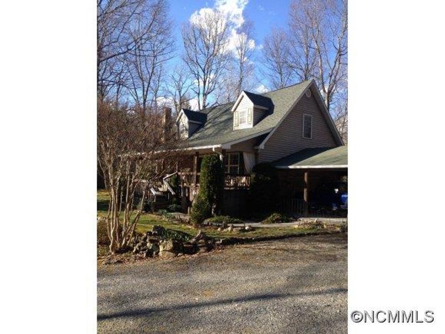 If you want to be "Off beaten path", you need to look at this ultimately private home. It is nestled in approx. 7.92 acres of wooded privacy. It borders the soon to be East Fork State Park (900+ Acres). How much more secluded can you get? It has a two bedroom septic. The home also has an addition which is not counted in the square footage. You'll enjoy sitting on the porch overlooking two streams, a waterfall and a pond. A nature lovers paradise