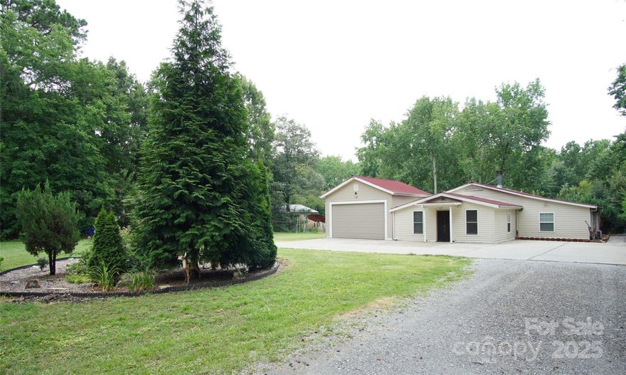 Rare Opportunity in Matthews! Nearly 1-acre, commercially zoned (TC) property with no HOA—ideal for residential, business, or mixed-use. 

Charming 3BR/2BA home with 11’ ceilings, open layout, and cozy fireplace. Features include 4 mini-split HVAC systems (2017–2024), 3 tankless water heaters, and durable Onduline roof (2014) with 30 years life expectancy.

Enjoy lush gardens, gazebo, and mature fruit trees (fig, peach, persimmon, pear). Great curb appeal with plenty of parking. Easy access to downtown Matthews, shops, and parks. Endless potential!

Please, schedule an appointment to see the house.