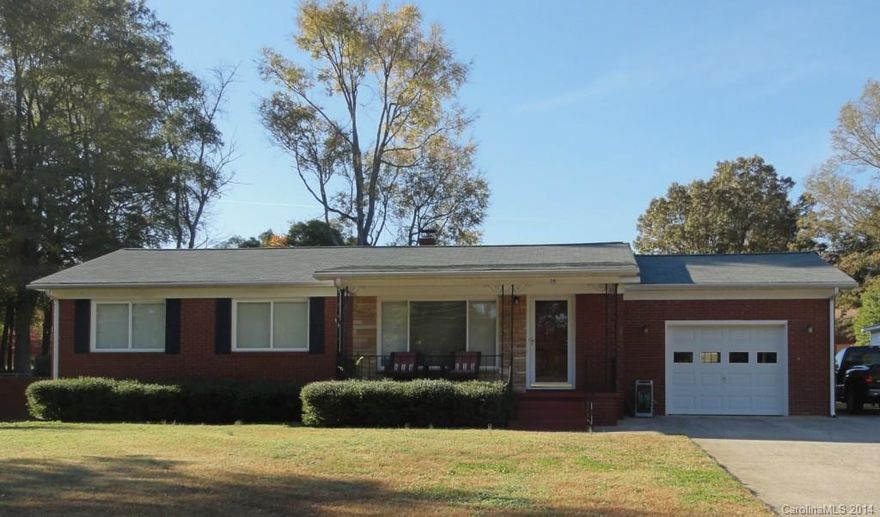 Charming ranch in great neighborhood & great location, convenient to everything.  Home offers large eat in kitchen, featuring 42" cabinets.  Huge living room with luscious carpet throughout, tile in bathroom, smooth ceilings, fresh paint and pre-wired for surround sound.  Tons of updates and very clean.  1 car garage attached, separate workshop, and an additional storage building. All of this for under $110,000!! Seller had inspection and made necessary repairs.  Must see!!