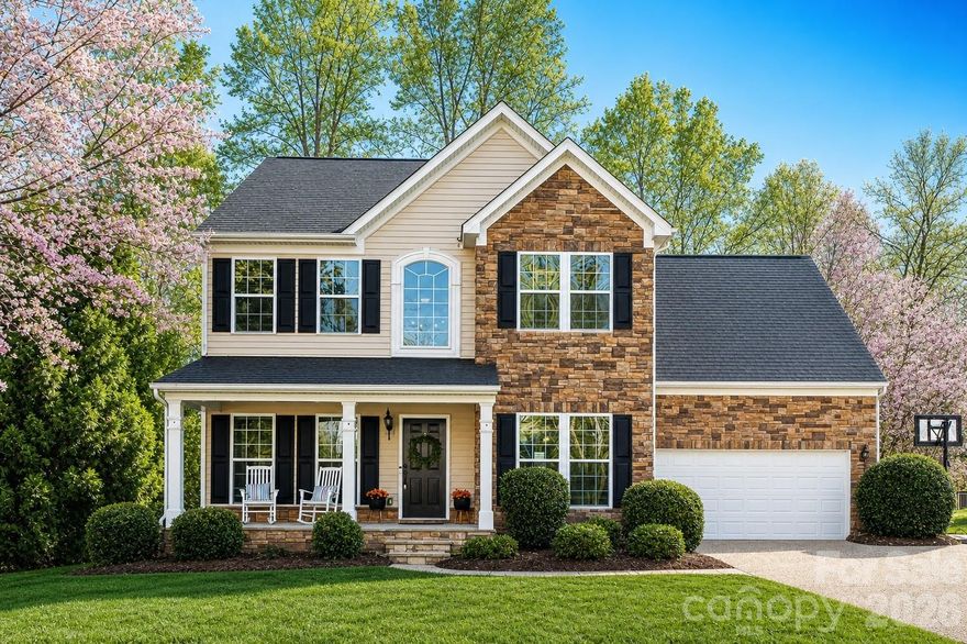 Welcome to the perfect blend of space, comfort and convenience in this beautifully appointed home.  Top school district, affordable taxes, tucked in quiet cul-de-sac with seasonal water view of Lake Wylie.  This property delivers both privacy and proximity to everything you need.  Step inside to a warm and inviting entry where main floor offers an office with french doors, dining room perfect for hosting. A cozy living room centered with a stacked stone that is open to the kitchen, just in time for the holidays!  A bright & sunny flex space/sunroom offers endless possibilities - playroom, gym, etc.  The spacious kitchen opens seamlessly to all, making everyday living and entertaining effortless.  Upstairs you'll find large secondary bedrooms and a generous primary suite.  The 3rd floor bedroom/bonus provides even more flexibility - ideal for teens, media room, guests or private retreat. Graves Plumbing has been contracted to install a 3rd floor bonus room bathroom with buyer allowance for selections with acceptable offer; Making this home a 5 bedroom 3.5 bathroom! Outside, enjoy a private backyard with a water view of Lake Wylie - all in a desirable cul-de-sac setting.  Community offers lake access for your personal watercraft, picnic area and playground.