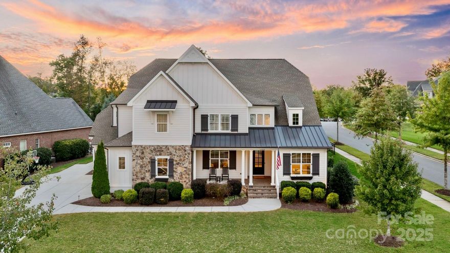 Welcome home to this stunning 2019 ES Johnson custom-built residence in The Reserve at River Run, one of Davidson’s most prestigious communities. Meticulously maintained and thoughtfully designed, this exquisite home offers 5 bedrooms and 5.5 baths, combining timeless craftsmanship with modern luxury.  Step inside and be greeted by an abundance of natural light and an open, flowing floor plan that’s perfect for both everyday living and entertaining. Every detail reflects true custom quality — from the extensive millwork and built-ins, to the designer finishes throughout. The chef’s kitchen is a dream, featuring a farmhouse sink, two dishwashers, top-of-the-line cabinetry and appliances, and a generous island ideal for gathering. A sophisticated home office offers the perfect workspace, while the front entertainment room can easily serve as a game room, lounge, sitting area, or bar.  At the rear of the home, a private guest/in-law suite provides exceptional flexibility with its own living space, full kitchen, laundry, bedroom, and bath, plus a separate rear entrance and parking pad—ideal for extended family, an au pair, or long-term guests. Upstairs, retreat to your serene primary suite featuring a spa-like bath and custom closet system. Three additional bedrooms, each with its own ensuite bath, a spacious bonus room, and an upstairs laundry room complete the upper level. Ample storage and thoughtful design make every square foot of this home functional and inviting. Enjoy Carolina evenings on the screened-in porch with fireplace, overlooking the fenced backyard—perfect for pets, play, or gatherings with neighbors. Additional features include a three-car oversized garage with epoxy flooring, whole-house water filtration system, landscape lighting, and full-yard irrigation.
Located just a short stroll from the Greenway Trail entrance (<0.25 mile), you can bike or walk to nearby River Run amenities, and you’re minutes from Davidson’s charming shops, restaurants, and quick access to I-77 and I-85.
Come experience the lifestyle and luxury that make The Reserve at River Run one of Davidson’s most sought-after addresses!