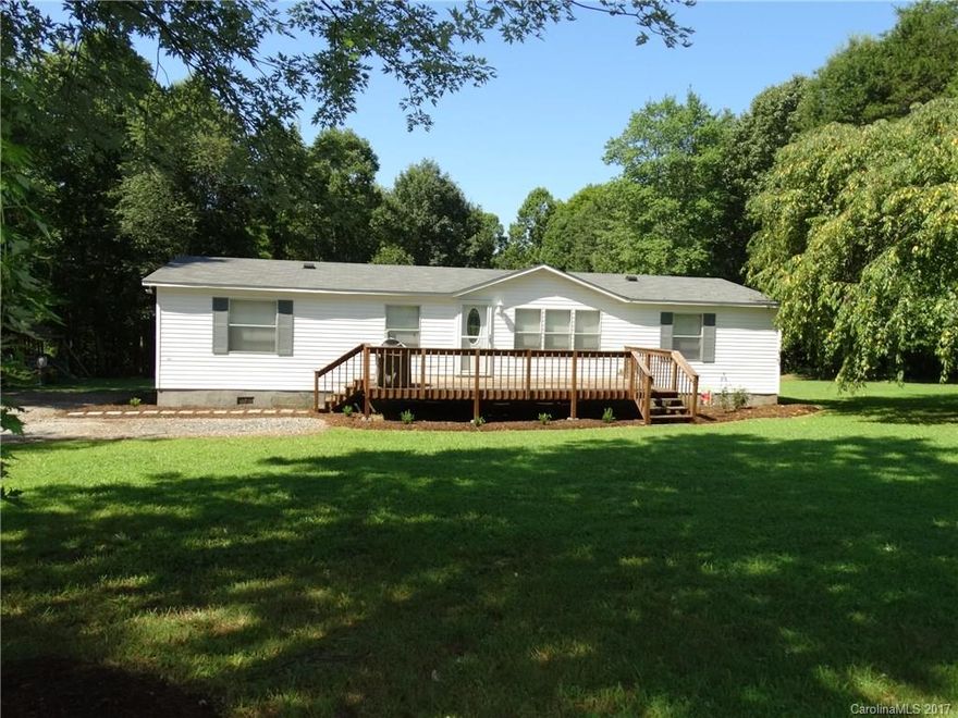 Great location behind Lawson Creek! Enjoy lrg lvl front yard & rear yard/wooded area for play (3.41 acres). Ranch home has many upgrades & has feel of being very spacious. Cathedral ceiling w/open floor plan, great room & dining w/hdwd design laminate. Kitchen renovated w/tile, cabinets, hardware, appli w/appealing black & white theme. Lrg mstr suite w/office area & renovated mstr bathroom w/earth tone tiles, 2 sinks, jet tub, spacious tile shower. Laundry room off kitchen w/rear deck access.