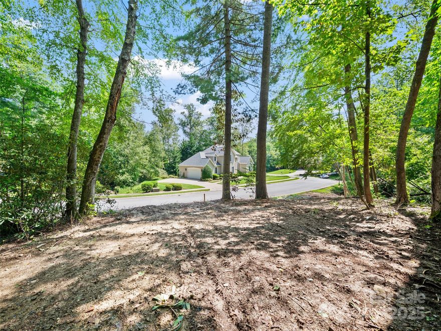 Discover the perfect setting for your dream home with this 1.23-acre double lot in the quiet Creekside community of Hendersonville. Tucked away on Mistletoe Trail, Lots 43 and 44 offer a wooded landscape that provides privacy, natural beauty, and the charm of a mountain setting while still being minutes from town conveniences. This property is ideal for a single-family residence and offers flexibility for custom home design. The homesite features gentle topography, mature trees, two creeks, and the soothing backdrop of nature, creating a peaceful retreat. With city water/sewer access (buyer to verify), and easy access you’ll enjoy the convenience of being close to shopping, dining, the Asheville airport and Hendersonville’s vibrant downtown. Whether you’re seeking a primary residence or a mountain getaway, this property offers a rare opportunity to build in one of Western North Carolina’s most desirable areas. Contact the listing agent and schedule your private showing today!