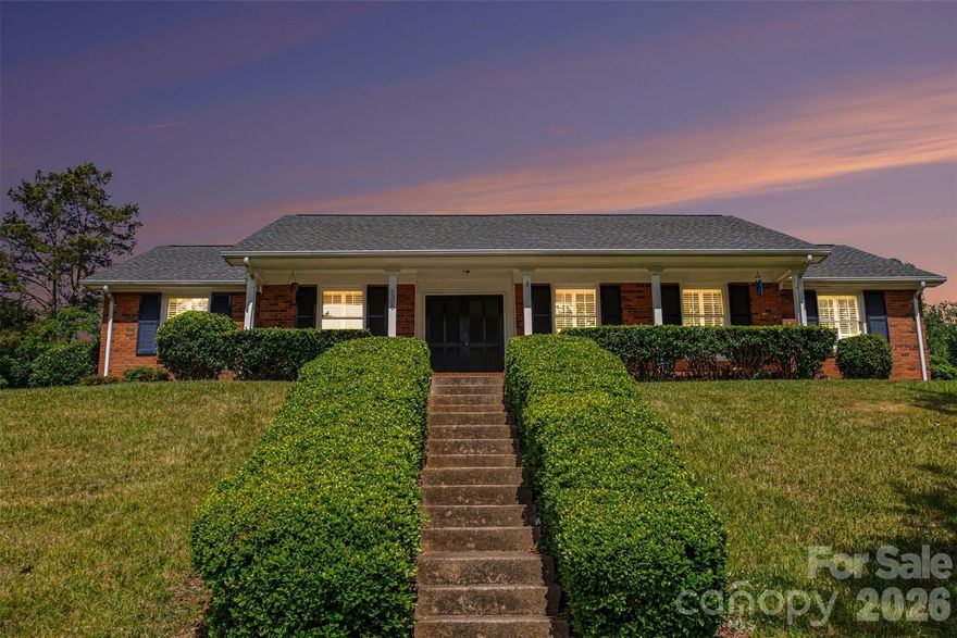Well-maintained 3BR/2BA ranch home located in an established Charlotte neighborhood. Features include hardwood, tile, and laminate flooring, a spacious living area with fireplace, and a functional floor plan. Kitchen includes dishwasher, washer, dryer, electric cooktop, and disposal. Exterior features include a concrete driveway, storage building, and mature corner lot with convenient access to shopping, dining, and major highways.