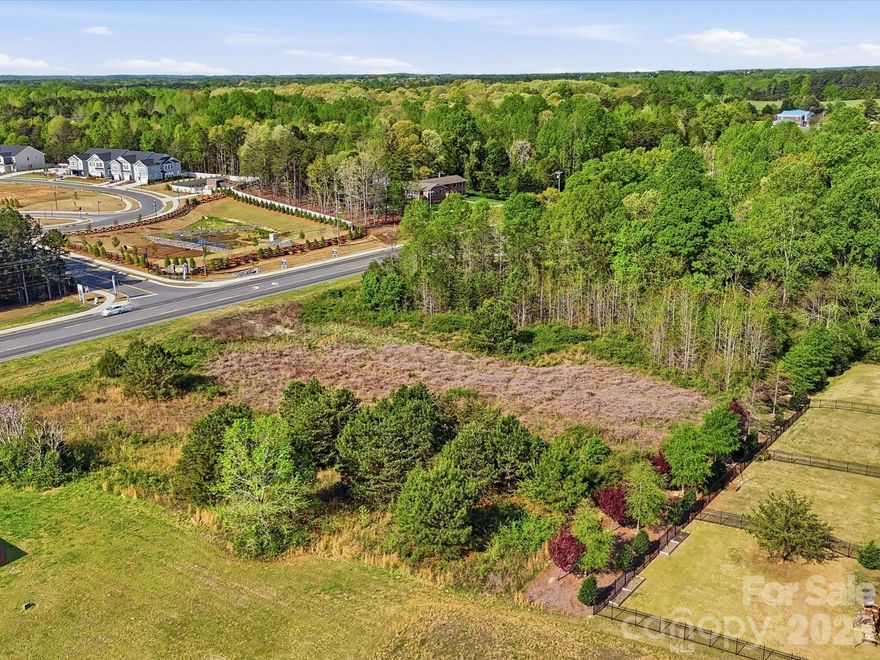 Prime opportunity to secure a high visibility commercial lot in a rapidly growing area. Offering over 2 acres and located within city limits, this property is zoned B-2, allowing for a wide range of commercial uses making it an ideal investment for developers, business owners, or those looking to expand their portfolio. Strategically positioned with excellent road frontage and easy access, the property benefits from strong traffic flow and outstanding exposure, providing maximum visibility for future development. Surrounded by established businesses and ongoing growth, this location supports both immediate opportunity and long term appreciation. With ample space to bring your vision to life, this versatile parcel presents endless possibilities for retail, office, or mixed use development. Interested parties are encouraged to confirm availability of utilities to suit their specific needs. Don’t miss this chance to secure a prime commercial property in the thriving and expanding market of Clover SC!