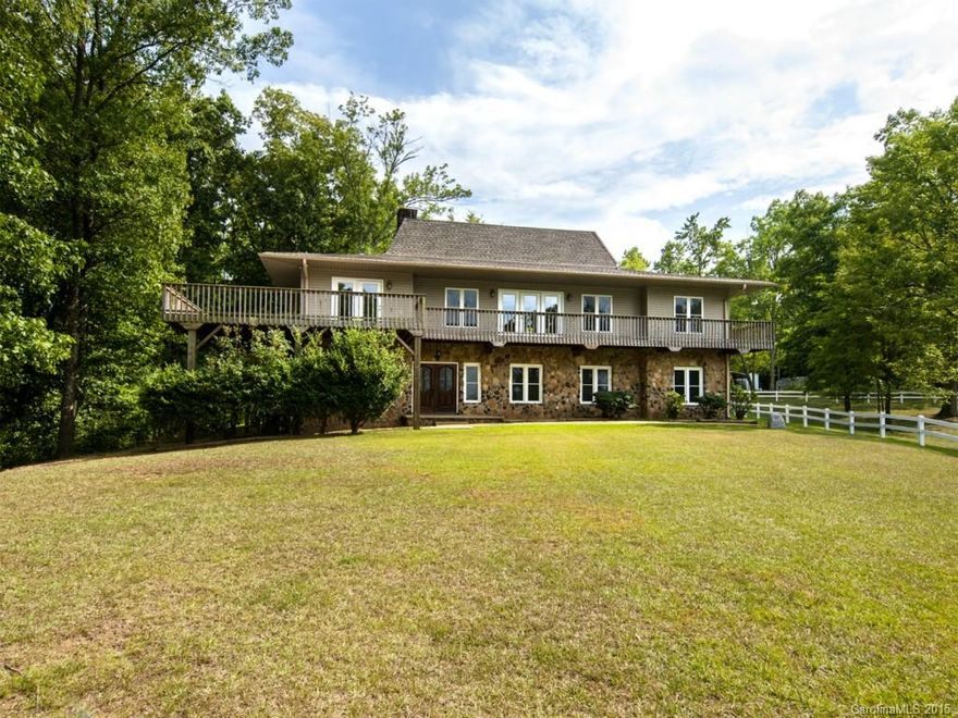 Breathtaking lakefront views abound from totally renovated home on a serene 1.63 acre lot. Home w/all the bells & whistles in over 3100 sf. Attention to every detail including heavy moldings, gleaming HWs, custom cabinetry, granite counters, vaulted ceilings. Open & spacious kitchen & living areas. Huge master suite w/spa-like bath w/dbl sinks & whirlpool tub. 3 additional BRs each w/private bath. Bonus w/wet bar & rec room. Wrap around deck, gazebo overlooks lake w/dock. Quiet cove w/big views.