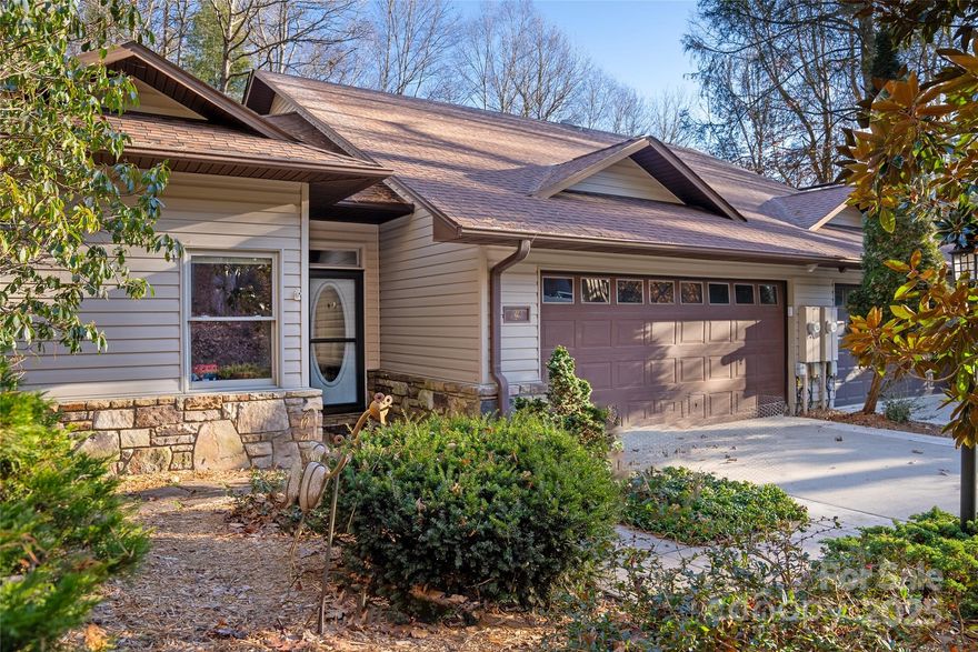 Discover relaxed mountain living in this beautifully maintained townhouse located in the highly desirable Qualla Village community of Connestee Falls, perfect for retirees or those seeking a peaceful second home. Thoughtfully designed for easy one-story living, the main level offers comfort, convenience, and flexibility in a serene natural setting.
The main level features a spacious primary suite, an additional bedroom and full bath, and a dedicated office that works beautifully as a hobby room, reading space, or potential fourth bedroom. The heart of the home is the inviting Great Room with a gas fireplace, creating a cozy gathering place for quiet evenings or welcoming guests. An open dining and kitchen area makes everyday living and entertainment effortless.
The finished lower level is ideal for hosting family and friends, offering a comfortable family room with a wet bar, a private bedroom, and a full bath, providing guests with their own space while maintaining privacy upstairs.
One of the most appealing features of Qualla Village is its exceptional maintenance program, which supports a truly low-maintenance, lock-and-leave lifestyle. Community services include driveway resealing, tree service and inspection, pressure washing, deck staining, and roof cleaning. Please be sure to ask for the attached Qualla Village Maintenance Schedule in the MLS for complete details.
Located within the gated community of Connestee Falls, residents enjoy access to outstanding amenities including lakes, scenic hiking trails, waterfalls, golf, tennis, pickleball, clubhouse dining, and a vibrant calendar of social activities. Whether you are downsizing, retiring, or searching for a mountain getaway, this home offers comfort, convenience, and peace of mind in one of Western North Carolina’s most beloved communities.
