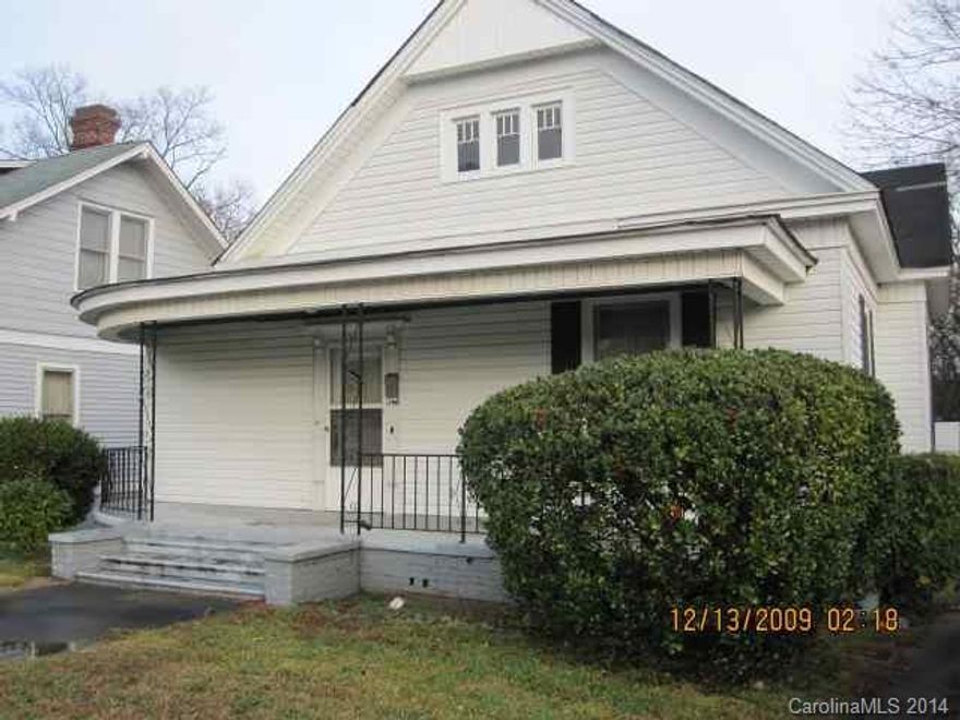 Beautiful older home built in the early 1900's. This structure has been well taken care of through the year and offers large, spacious room w/high ceilings & lots of windows. features include a large foyer, LR, DR, kitchen, office and 3 BRs & 2 full baths. Also, covered front porch & 2 car carport plus large backyard.