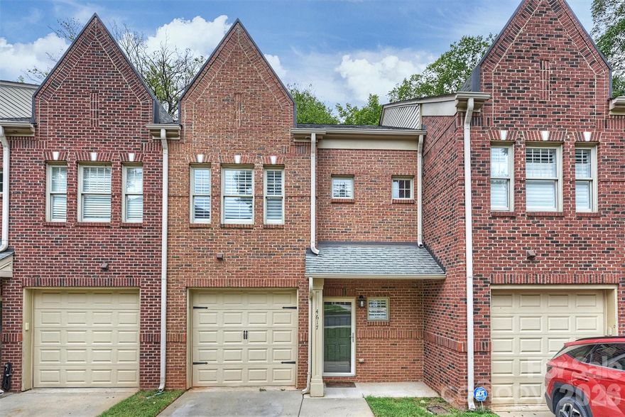 Full brick townhome in highly desirable Madison Park. It offers convenience to the airport, South End and Park Road Shopping center. It is an easy commute to Uptown Charlotte. The main floor features high ceilings hardwood floors and an open floor plan. The white kitchen has granite counters  tiled black splash and stainless appliances. A fully enclosed courtyard with patio is surrounded by a shadow box fence providing a private outdoor retreat perfect for relaxing or entertaining. Upstairs, the primary bedroom suite includes  a spacious bathroom with a garden tub, separate shower and large double vanity. Complete with a one car garage, this home sits in a quiet neighborhood with excellent access to shopping, dining and city life.