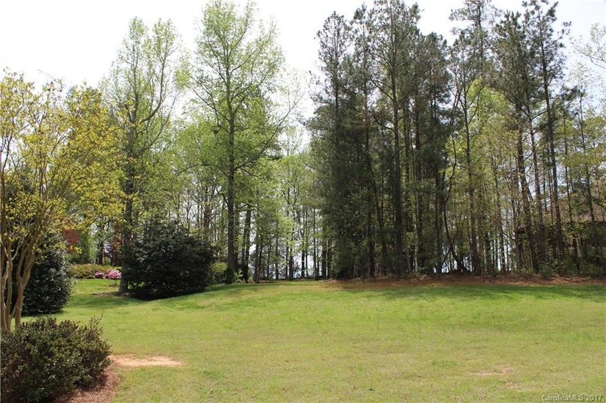 Beautiful level lot on a cul de sac in a small community of custom homes. Community features a pond, a tennis court and two roundabouts. Bring your custom home builder plans and build your dream home on a lovely, quiet, treed lot! Zoned for Marvin schools and close to Waverly, Blakeney and 485. Just barely in Union County off of Providence Road.