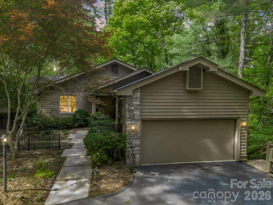 Welcome to this beautifully updated home in the desirable Timber Creek community- where comfort, style, and setting come together seamlessly.  This 2-bedroom, 2-bath home also offers a versatile additional room perfect for a den, office, or bonus space to fit your lifestyle.  Inside, you'll find a bright, open-concept layout with fresh interior paint and an updated kitchen that flows effortlessly into the main living areas- ideal for both everyday living and entertaining.  Both bathrooms have been tastefully updated, and the bedrooms feature brand new carpet for a fresh, move-in-ready feel.  The spacious primary suite is a true retreat, complete with two walk-in closets offering ample storage and convenience.  Step outside and enjoy the expansive decks that overlook a beautifully situated lot filled with mature trees, creating a peaceful and private setting.  Whether you're enjoying your morning coffee or hosting friends, this outdoor space is a standout feature.  Additional highlights include a new roof, a two-car garage, and two generously sized storage rooms located below the deck with easy access to the crawlspace- perfect for tools, outdoor gear, or seasonal items.  Located in the lovely Timber Creek community, this home offers the perfect blend of updates, functionality, and natural beauty.  A rare find that's ready for its next chapter.