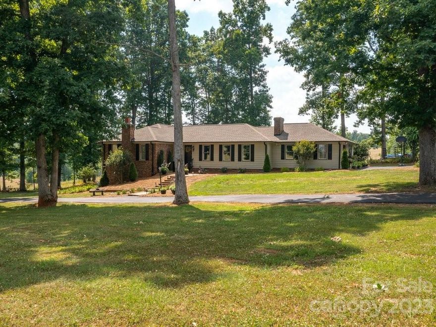 You will feel like you are on vacation year round, with over 400 feet of creek access on Little Buck Creek right in your backyard.  This well maintained 4 bedroom, 3 bath home on 4+ unrestricted acres offers a eat-in kitchen that has stainless appliances and solid surface countertops. The home has a formal dining room perfect for entertaining and hosting family holidays. Gather in the living room around the wood burning fireplace for cozy evenings in or game nights. The master bedroom is on the main floor and has a master bath with separate tub and shower.  There are 2 more bedrooms on the main floor and an additional bedroom plus an extra living area in the basement with lots of potential.  There is a detached garage that is perfect for the hobbyist. The roof was replaced in 2019 and the HVAC just this year. Great location and awesome property.  Two lakes within 15 minutes of the home so bring your boat and enjoy. Schedule your showing today.