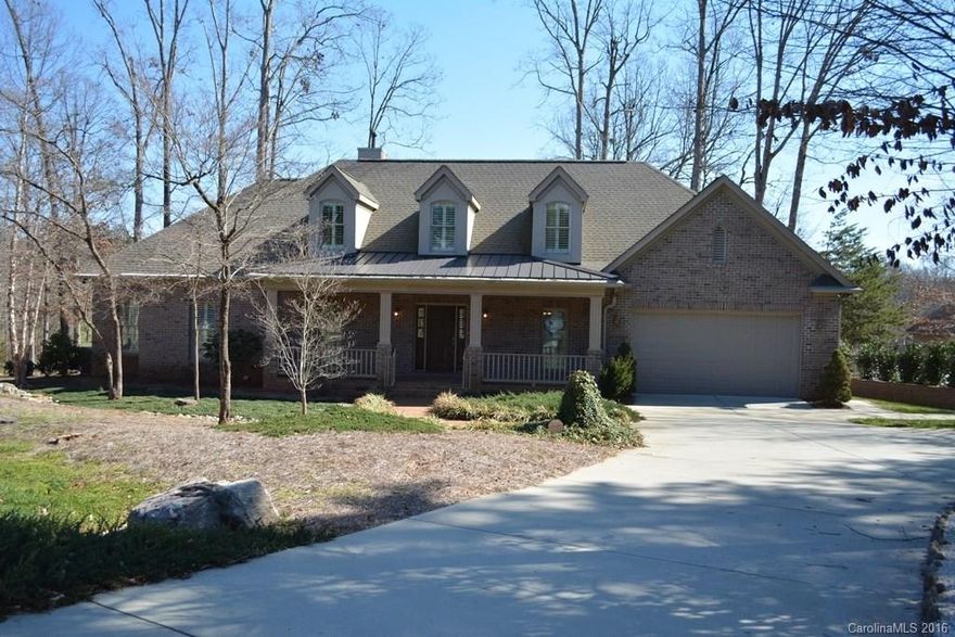 Custom All Brick immaculate home! Unique floor plan has master w/luxury bath and additional bedroom w/ full bath on the main level! Features; stack stone fireplace, hardwoods, over sized base and crown moldings, granite counters, pull out shelving, California style closet shelving everywhere, architectural sheet rock corners, huge laundry/mud room, custom plantation style shutter window treatments, and lots of walk in storage make this home a must see! Beaties Ford access area less than a mile.
