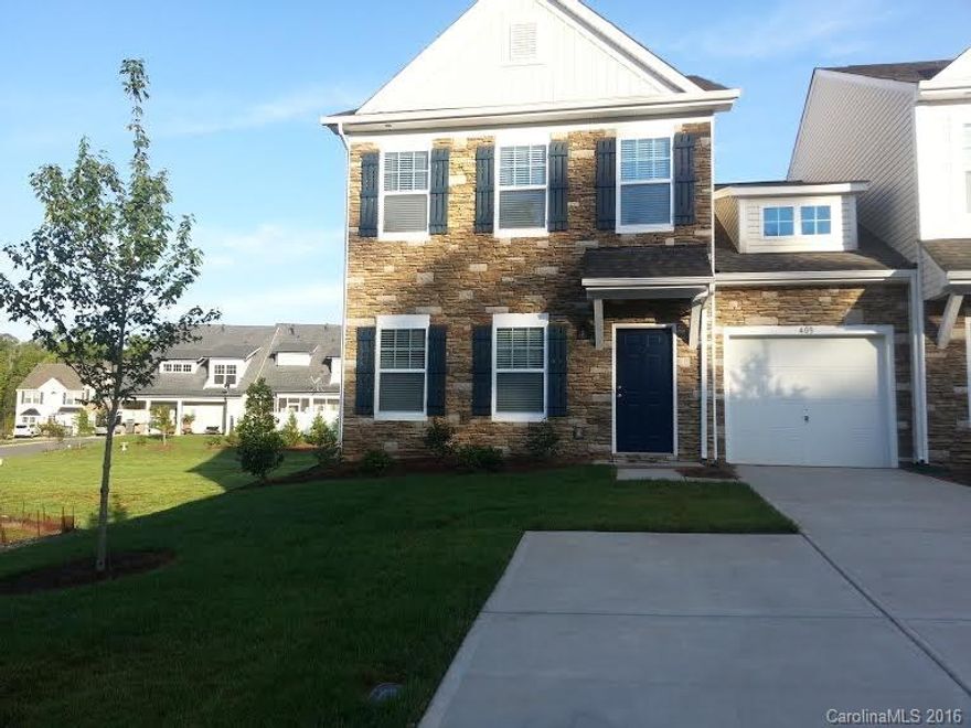 Beautiful upgraded End Unit town home with Sought after Master Down layout, Shows like a model, open floor plan and tons of style! This 3 bedroom 2.5 bath floor plan includes a bonus/storage room upstairs. Finish includes  & Hardwoods, Ceramic Tile Flooring, Stainless Steel Appliances, Granite in Kit & Baths, Custom Trim & Paint, Upgraded lighting & more! Gated Community convenient located near Lake Wylie & minutes to Charlotte, Gastonia, Rock Hill.