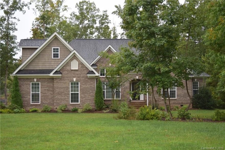 Fantastic move in ready water front home.  Kitchen with granite counters, gas cook top, stainless appliances.  Level lot with floating dock and wide cove views.  Large master bedroom with sitting area.  Formal dining and living that is currently used as home office.