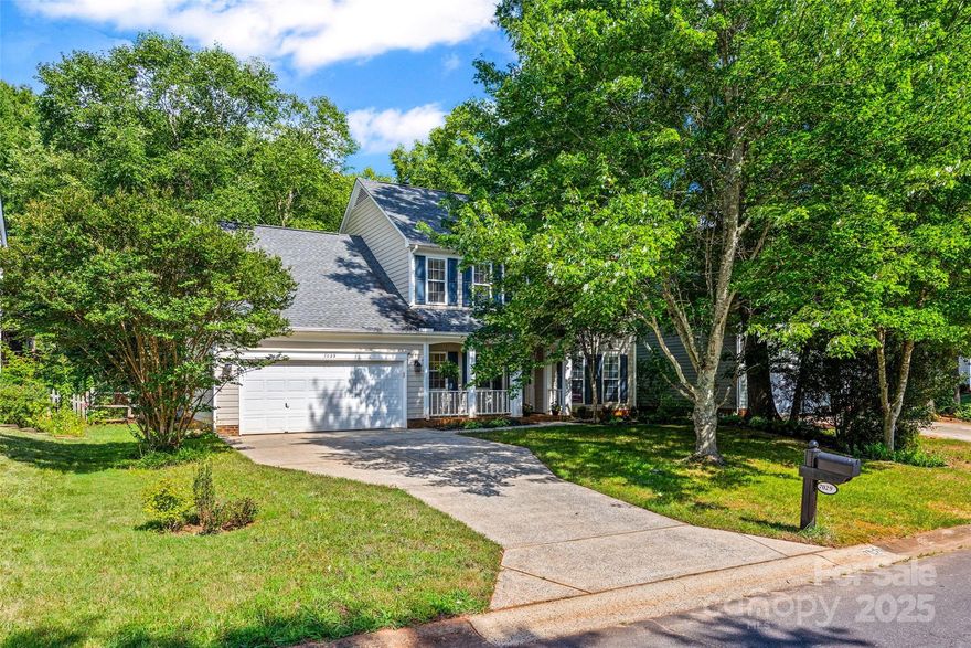 Welcome to Bradfield Farms.  This charming 2 story home greets you with an adorable front porch & great curb appeal. Step inside to an open floorplan with a 2 story foyer that leads to the dining room space.
The updated kitchen is a wow factor featuring painted cabinets, white quartz countertops, a large single stainless-steel sink, & a sleek tile backsplash.  A perfect space to host your next gathering. The expansive screened in porch over looking the back yard is the heart of the home.  Relax out back with your morning coffee & enjoy the privacy of the large trees and peaceful vibe.  Upstairs features the primary suite with a separate tub & shower, dual sinks, & walk in closet.  Down the hall are 2 additional bedrooms, a guest bathroom, as well as an optional 4th bedroom or bonus space.  Updates: included roof (2021), Upstairs HVAC unit only (2025), & water filtration (2022)
Enjoy Summer living here and all of the community amenities: pool, clubhouse, tennis courts & playground.