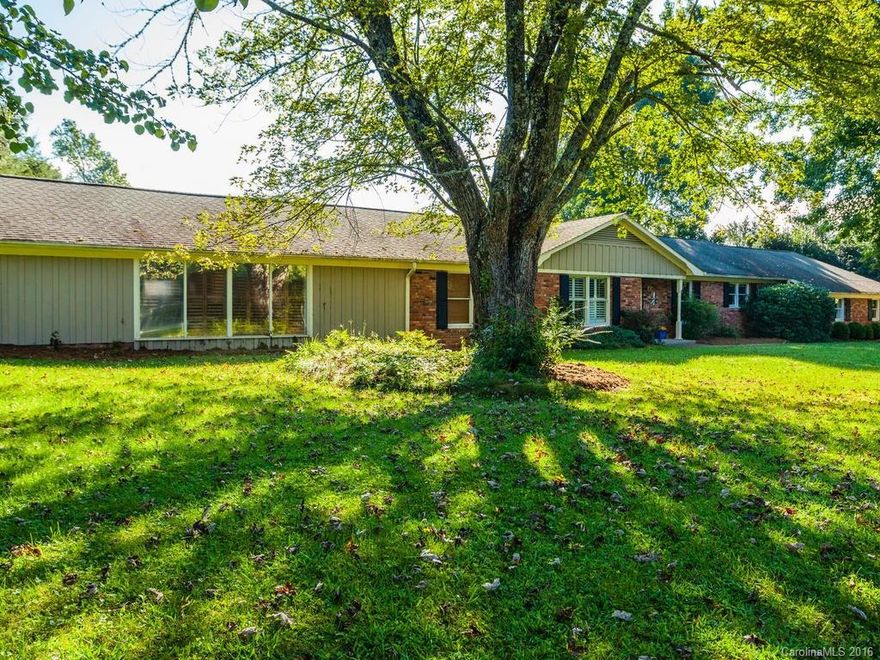 Listed $30,000 under appraisal! Appraisal and Inspection Report Attached. Beautiful home on one level with huge master suite & remodeled bath featuring gorgeous tile shower, whirlpool tub and his/hers walk-in closets. Master Suite includes a large office/sitting area which opens to the pool and patio in back. Home adjacent to the golf course with beautiful views of the course and mountains. Hardwood Floors,brick fireplace,covered patio, inground pool. Minutes to Hendersonville.