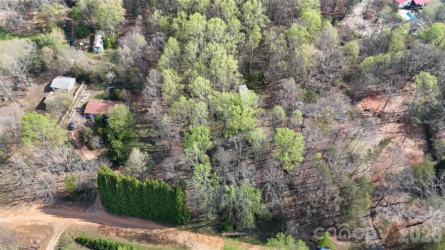 Great opportunity to build your dream home on this spacious lot! Property includes an existing singlewide home that is uninhabitable and conveys at no value. Well and septic are already in place; however, the seller makes no representation as to their condition. With utilities available and plenty of potential, this property is ideal for investors, builders, or buyers looking to create a custom home. Endless possibilities—bring your plans and make it your own!