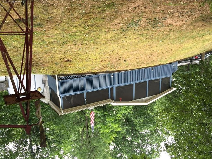 Very nice, very clean, very green and peaceful. This home is the best kept double-wide I have seen. It is move-in ready. Large yard and many mature hardwoods on the acreage. Only 20 minutes to town but you are in the quiet country.