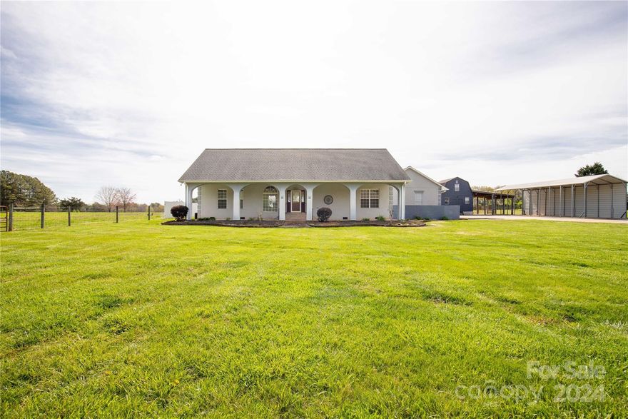 Escape to the countryside with this stunning and serene property!  Featuring 5 acres of land that are fully fenced and cross-fenced which is ideal for keeping animals.  It also includes a wired workshop, barn, and RV storage.  The comforts of home are welcomed with natural light streaming in the grand windows where the main level opens to a spacious living room that blends into the dining area and kitchen.  Included on the main is the primary with an ensuite and access to a private patio area along with a home office and flex space that could double as a guest room.  Upstairs, the accommodating bonus room is perfect for a media and lounge area plus there's two additional bedrooms and a full bath.  Unwind on the covered porch with a hot tub or gather around the fire pit in the backyard.  Here, there is room to garden, grow fruit trees, and live off your land.  Don't wait too long, this mini farm won't be available for long!