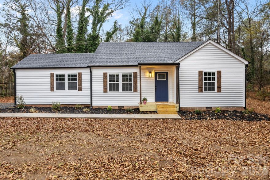 BACK ON MARKET — NO FAULT OF SELLER!
NEXT-TO-NEW | FULLY RENOVATED | PRICED BELOW MARKET VALUE | MINUTES TO LAKE TILLERY| QUICK DRIVE TO ALBEMARLE

Your second chance has arrived — and this one is worth the wait!

This beautifully renovated 3-bedroom, 2-bath home truly feels brand new. Completely updated from top to bottom with modern, stylish finishes, it offers the perfect blend of comfort, charm, and value in a peaceful setting.

Located less than a mile from downtown Mount Gilead, just minutes from Lake Tillery water access, and only 15 minutes to Albemarle’s shopping and dining, you’ll enjoy quiet living without sacrificing convenience.

Step inside to an inviting open floor plan designed for today’s lifestyle. The stunning kitchen is the heart of the home, featuring granite countertops, stainless steel appliances, and a spacious island perfect for entertaining, meal prep, or gathering with friends and family. The bright dining area overlooks the wooded backyard and expansive deck, creating the perfect indoor-outdoor flow.

The primary suite offers a relaxing retreat with a walk-in closet and private ensuite bath. Two additional bedrooms provide flexibility for guests, a home office, or hobbies — including one with direct access to the second full bath. A cheerful laundry room adds everyday ease.

Major upgrades include a new roof, siding, windows, luxury plank flooring, and beautifully updated bathrooms — offering peace of mind and modern appeal. A partial basement provides generous storage or future bonus space potential.

Enjoy slow mornings on the covered front porch or host evening gatherings on the spacious back deck surrounded by a private wooded yard.

Fully renovated. Move-in ready. Competitively priced.

Exceptional opportunity — schedule your showing today!