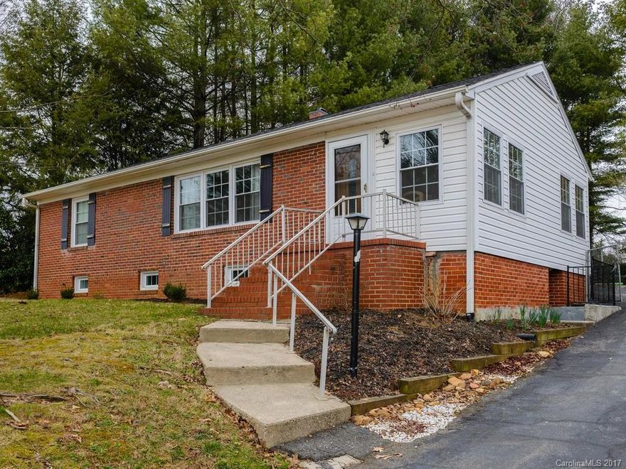 Beautifully updated move-in-ready home in coveted West Asheville.  Home features a basement with a separate entrance that would be perfect for a legal homestay VRBO or Airbnb.  The current owners use the extra bonus room in the basement as a 4th bedroom now.  This spacious home is walking distance to downtown West Asheville and a short drive into d/t Asheville.  Home features updated windows, roof, and HVAC.  Once you walk in the door you will want this home!